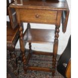 Edwardian oak drop leaf hall table with single drawer on barley twist legs