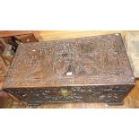 Oriental heavily carved camphor wood trunk