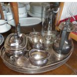 Silver-plated tea set on oval galleried tray with a contemporary glass lemonade jug
