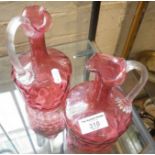 Pair of Victorian cranberry glass wine jugs