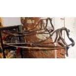 Two Victorian iron saddle racks