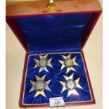 Cased set of 4 silver? Maltese Cross place card or menu holders. Each set with a 1776 Maltese coin