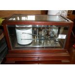 Barograph in mahogany case marked as "MADE BY D.J. HUTCHINSONB FROM HOLLAND & HOLLAND GUNMAKERS"