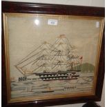 Victorian sailor's woolwork picture of a three-masted frigate and other boats, in maple frame 20"