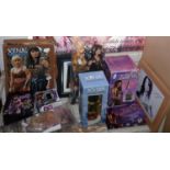 Two Xena Warrior Princess figures (Xena and Gabrielle), trading cards, postcard book, two printed