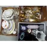 A good mixed lot to include brass candle sticks, bells, cigarette box and similar,