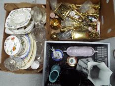 A good mixed lot to include brass candle sticks, bells, cigarette box and similar,