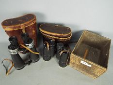 A pair of Barr & Stroud Glasgow & London 7x CF15 binoculars in leather case and a further pair of