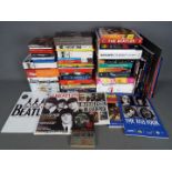The Beatles - A large quantity of Beatles memorabilia to include books and other publications, CD's,