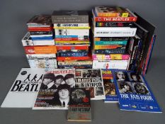 The Beatles - A large quantity of Beatles memorabilia to include books and other publications, CD's,