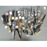 A selection of various wristwatches and watch parts.