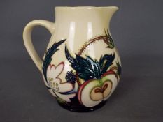 Moorcroft - a Moorcroft trial piece jug decorated in the Bramble Dell pattern,