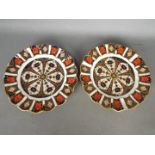 Royal Crown Derby - a pair of Royal Crown Derby cabinet plates decorated in the Imari palette,