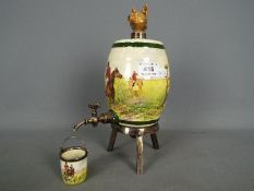 Royal Doulton - A Royal Doulton, Series Ware barrel form decanter, decorated with a hunting scene,