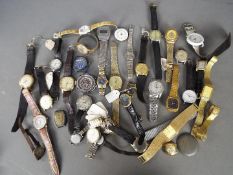 A collection of lady's and gentleman's wristwatches, watch parts and similar.