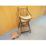 A vintage metamorphic doll's / bear's high chair / low chair and a wooden box with carved detailing.