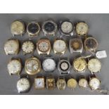 A collection of vintage wristwatch heads, lady's and gentleman's.