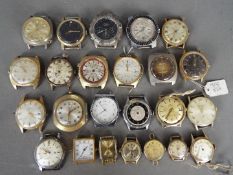 A collection of vintage wristwatch heads, lady's and gentleman's.