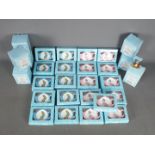 A quantity of boxed Border Fine Arts Beatrix Potter items, 27 pieces.