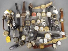 A quantity of wristwatches, watch parts and similar.