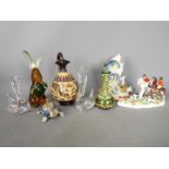 Lot to include a Murano style glass rabbit, Jena fish group,