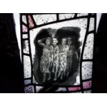 A printed glass panel depicting four ladies, approximately 30 cm x 25 cm.