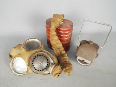 A World War Two (WWII) gas mask 4A by Barringer, Wallis & Manners Limited,