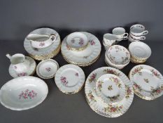 A good collection of dinner and tea wares to include Royal Albert Moss Rose pattern,