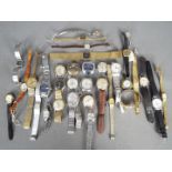 A collection of various vintage wristwatches.