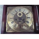 An early 18th century 8-day brass dial mahogany longcase clock,