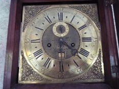 An early 18th century 8-day brass dial mahogany longcase clock,