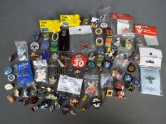 A collection of pin badges, lapel badges and similar, with enamelled examples.