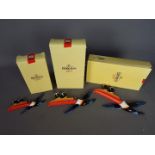Breweriana - a set of three graduated, Guinness 'Flying Toucan' wall plaques, boxed.