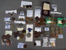 A quantity of coins, UK and foreign, commemorative crowns, Festival Of Britain crown.