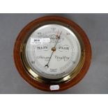 A good quality Short & Mason, London compensated, mahogany cased barometer of circular form,