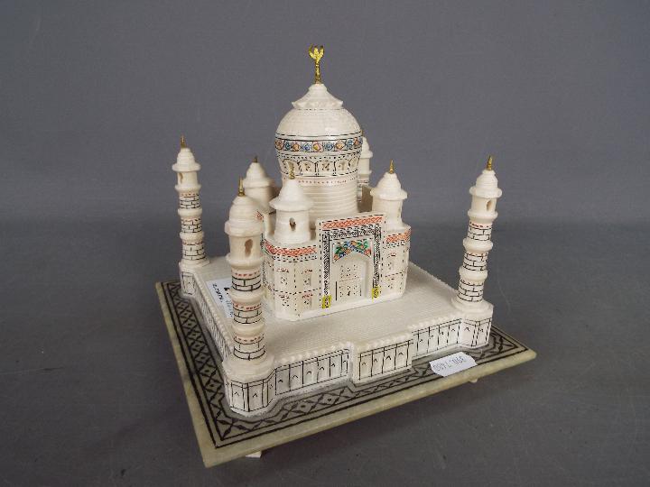 An alabaster model depicting the Taj Mahal with hand painted, coloured detailing, - Image 3 of 4