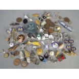 A mixed lot to include costume jewellery, coins, badges, buttons, cufflinks and similar.