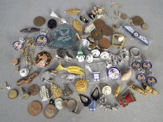 A mixed lot to include costume jewellery, coins, badges, buttons, cufflinks and similar.