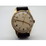 A 9ct gold cased gentleman's Tudor wristwatch, raised Arabic numerals to a white dial,