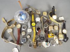 A collection of various wristwatches, watch parts and similar.