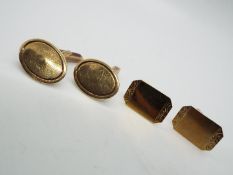 Two pairs of 9ct gold cufflinks, approximately 8.3 grams all in.