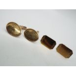 Two pairs of 9ct gold cufflinks, approximately 8.3 grams all in.