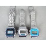 Three vintage digital wristwatches with stainless steel straps.