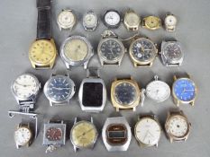 A collection of vintage watch heads, lady's and gentleman's.