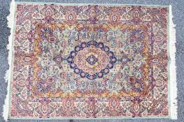 A good quality silk carpet measuring approximately 124 cm x 174 cm.