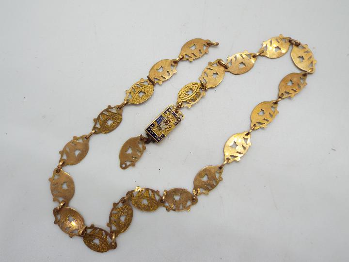 A yellow metal bracelet (a/f) with an enamelled clasp (unmarked) and a pendant with yellow metal - Image 2 of 3