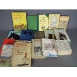 A collection of books to include Beatrix Potter, equestrian themed, Royal and similar.