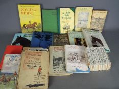 A collection of books to include Beatrix Potter, equestrian themed, Royal and similar.