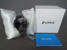 A gentleman's Lorus calendar wristwatch All items must be paid for and collected by close of