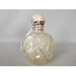 A large, George V silver topped cut glass scent bottle, Birmingham assay 1910,